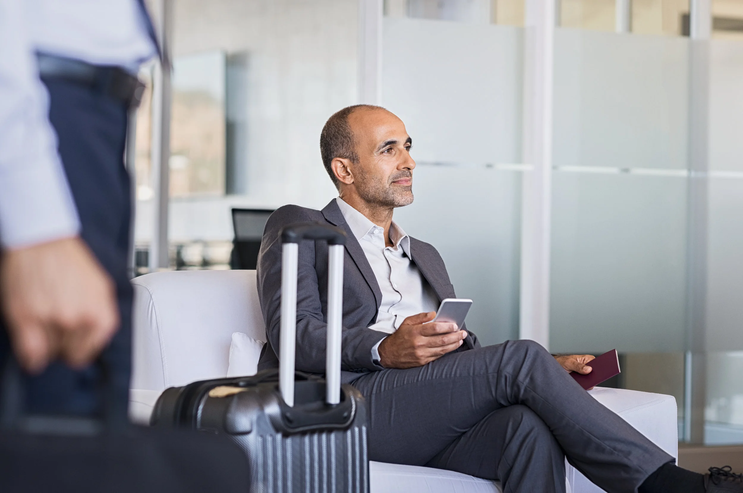 Businessman-waiting-at-airport-842865090_6144x4080.jpeg