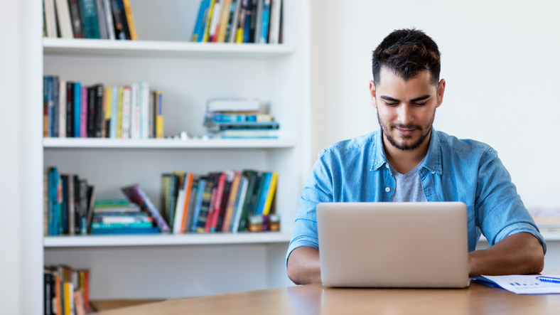 Mexican-hipster-man-working-with-computer-1127582480_792x445.jpeg