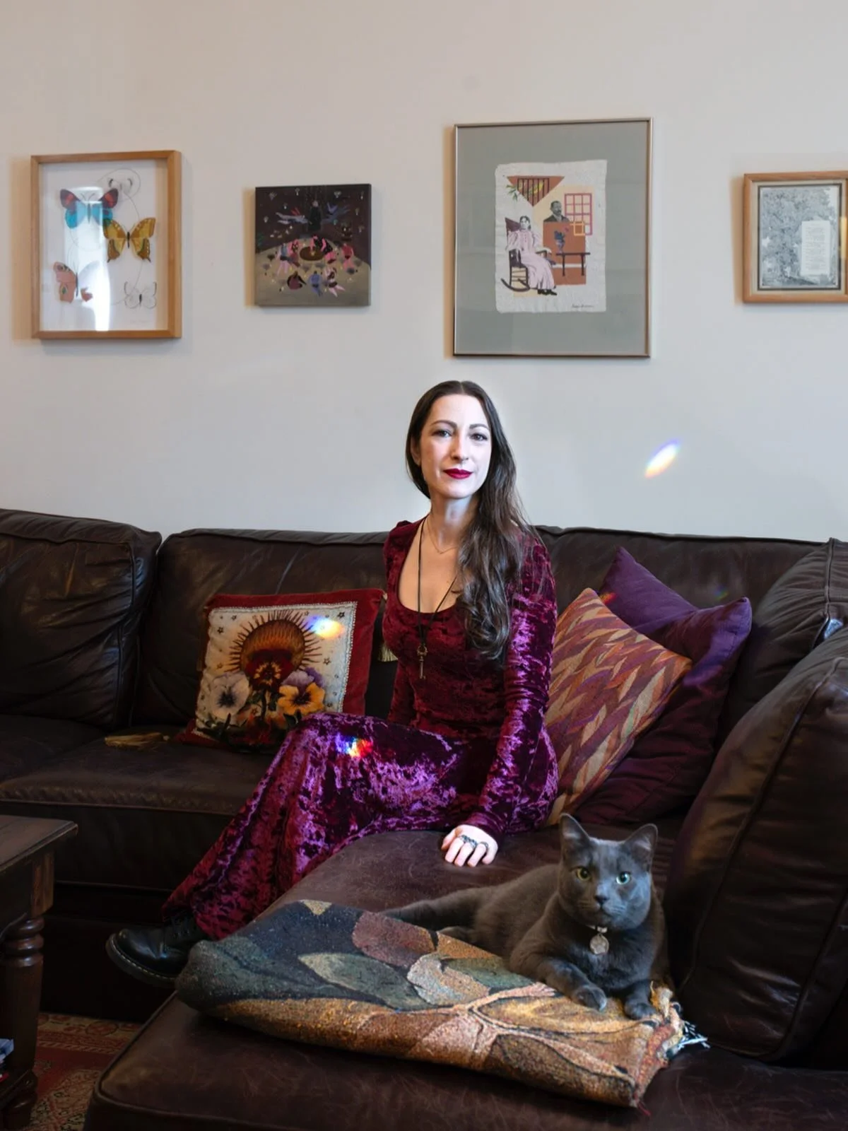 Happy Monday! In honor of the day, here&rsquo;s a portrait of me and Monday the Moon Cat, taken by @elisa.maenhout for her Rooted in Magic series of modern witches. Every day the sun filters through our stained glass hanging in the window at just the