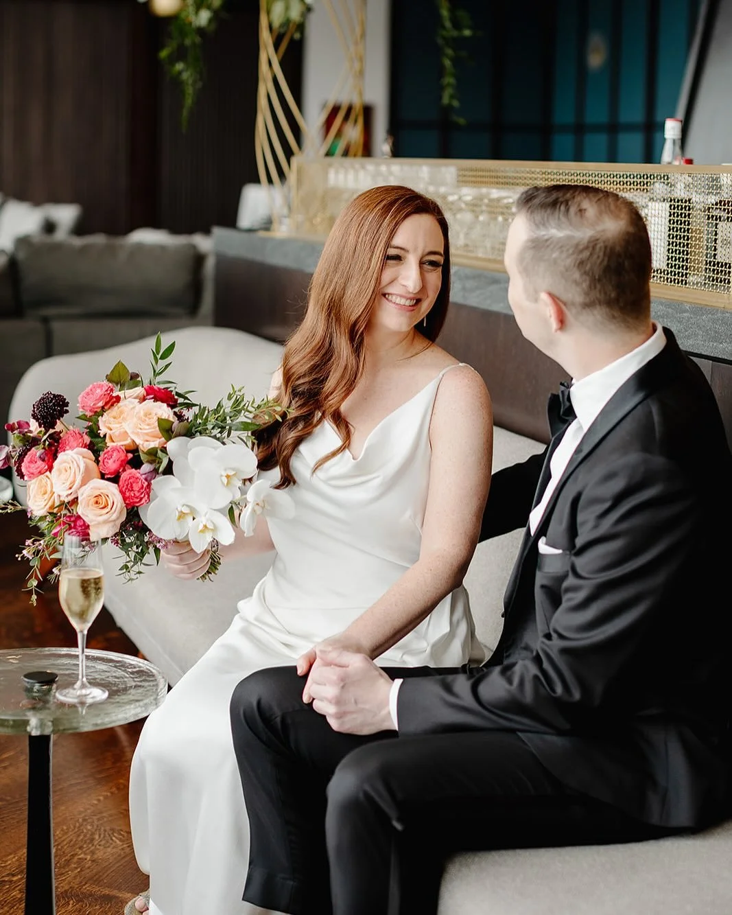 Add this to your timeline: a first look followed by a glass of bubbly (or your drink of choice!) before “I dos”
Francesca & Brett had the right idea — treating their wedding day like their favorite kind of date night. A private