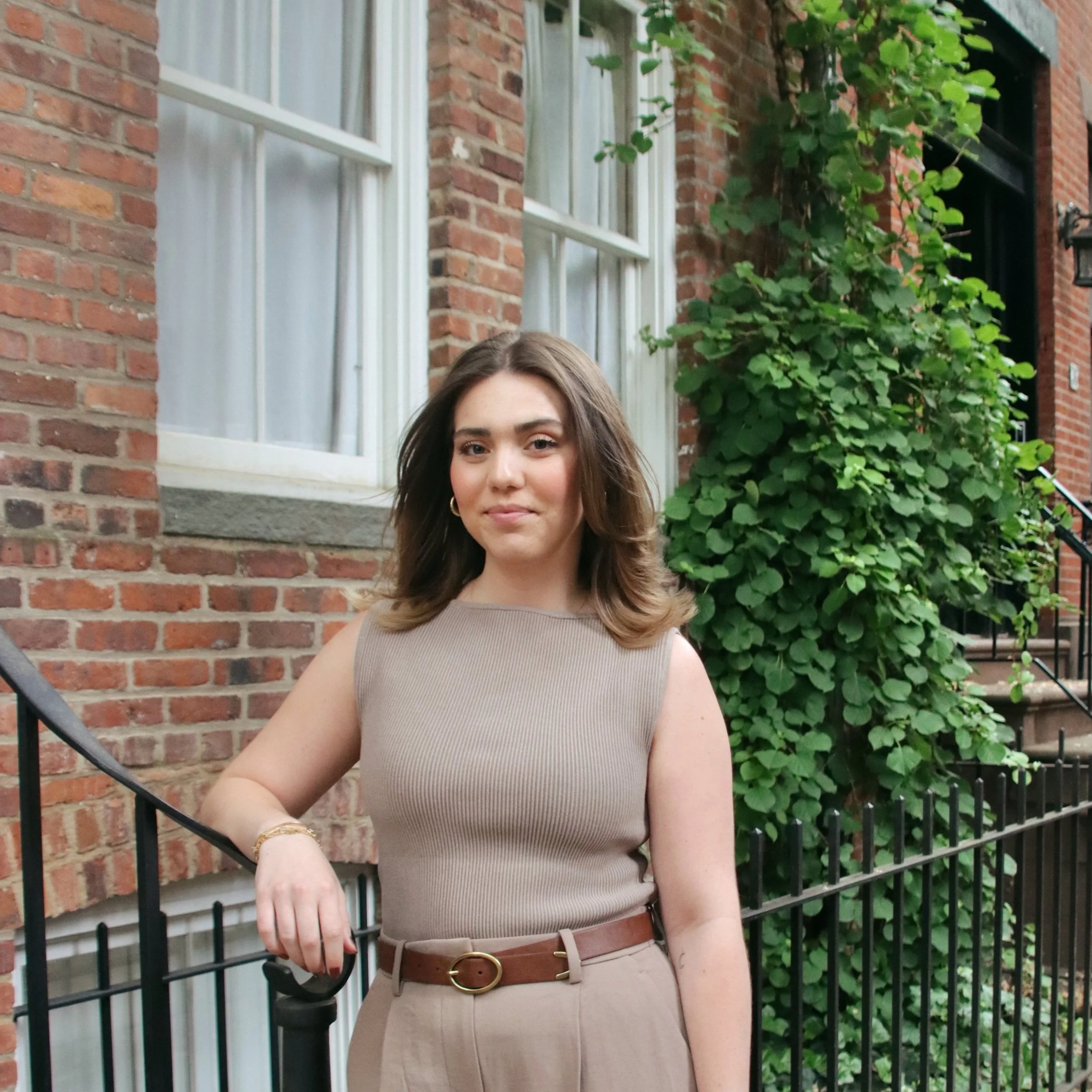MJ Falcon Gimenez stands outside NYC apartment