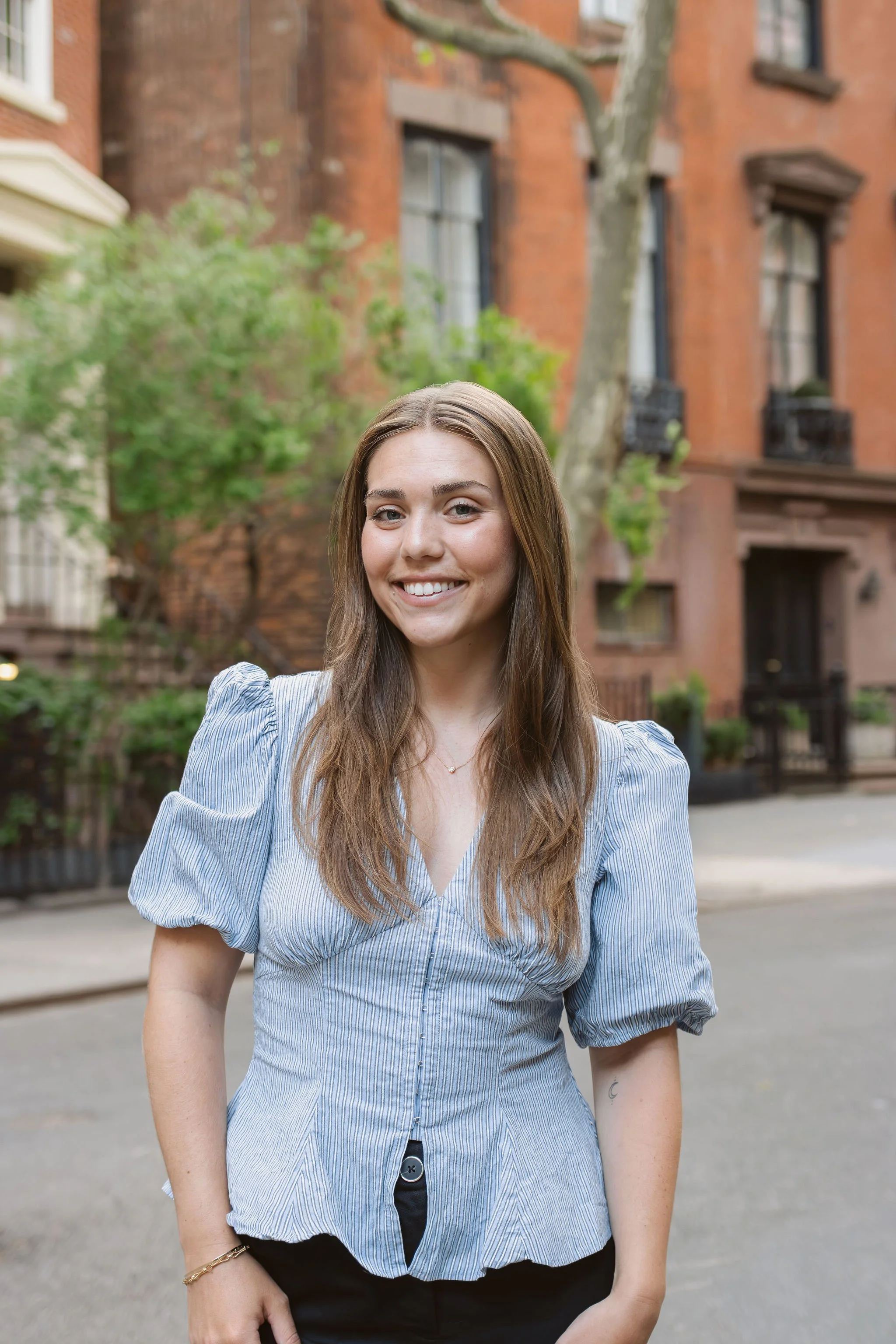 MJ Falcon Gimenez stands outside NYC apartment