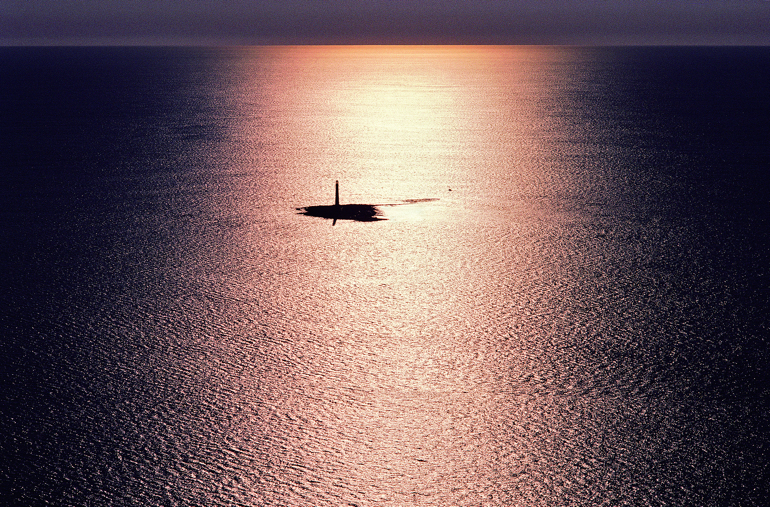 aerial lighthouse island boon island maine sun on water