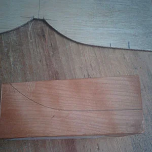 7. The cone profile is traced onto the wedge from the template
