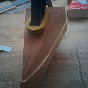 21. Each rib is squeezed between the two halves of the trimming mould