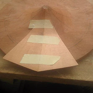 24. The trimmed ribs can now be assembled. Masking tape is used to hold them together