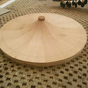 27. The tape has been removed and the cone lightly sanded. A 16mm disc of western red cedar has been glued onto the apex of the cone. Cone plus disc weighs 15gms