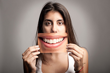 When you’re happy with the appearance of your teeth, you smile more.