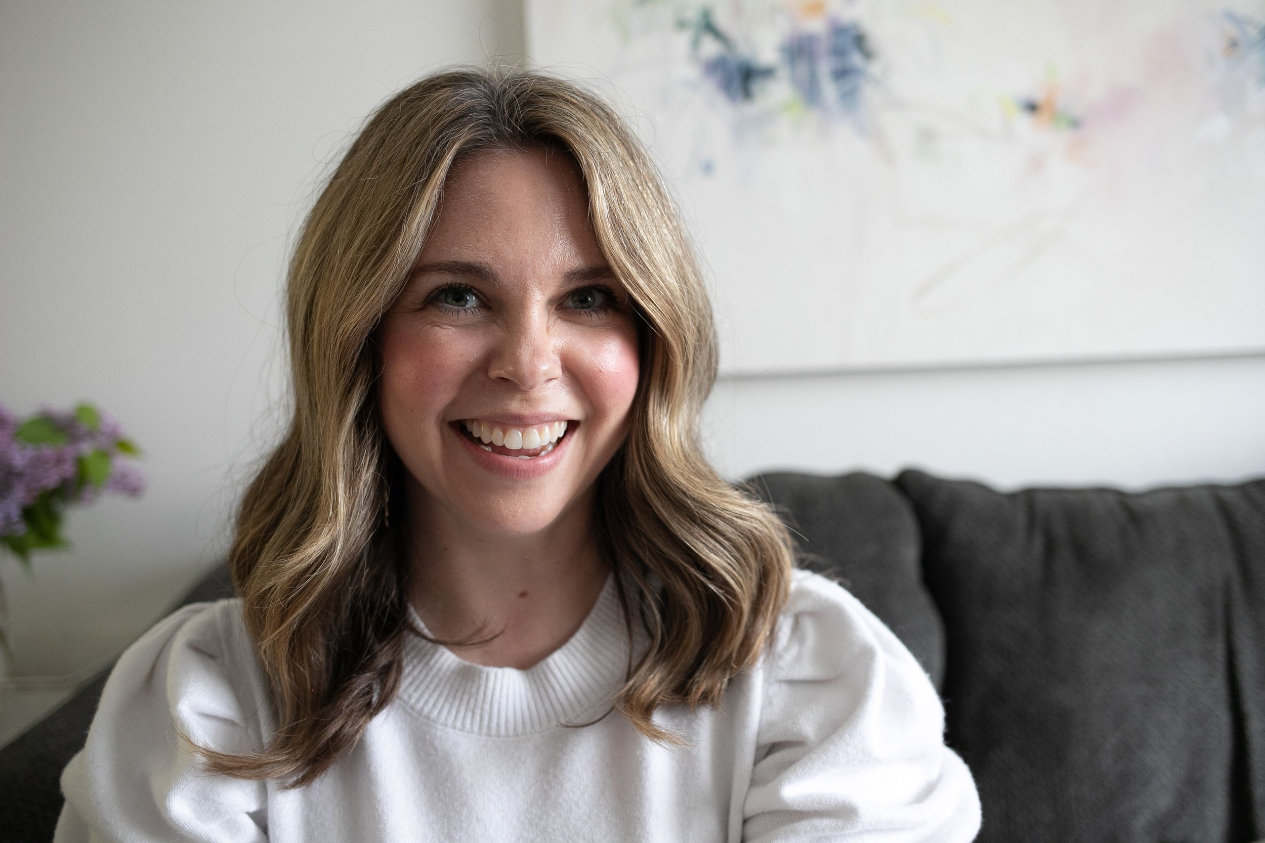 Nicole Bissett, Christian coach and writer, smiling indoors