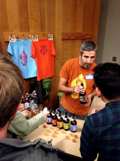 George Tsesoukas of Soma Kombucha (based in St. Johns) pouring up tart and tasty kombucha samples. So many different tasty flavors.