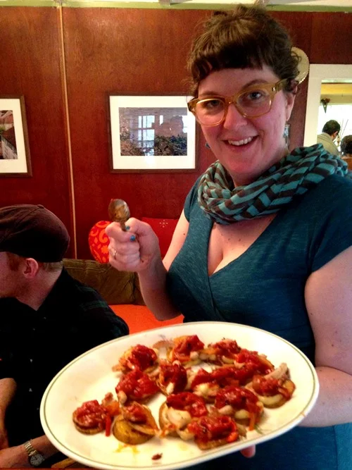 Loly with the finished dish.