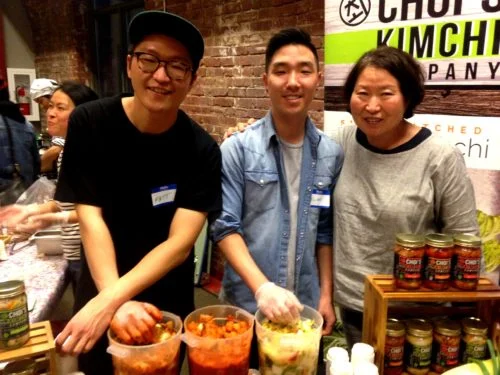 We first took her to the Choi's Kimchi table with Matt and Chong Choi and Elmo. Choi's is my very favorite kimchi. Matt and his mom come to the fest every year. We love them.