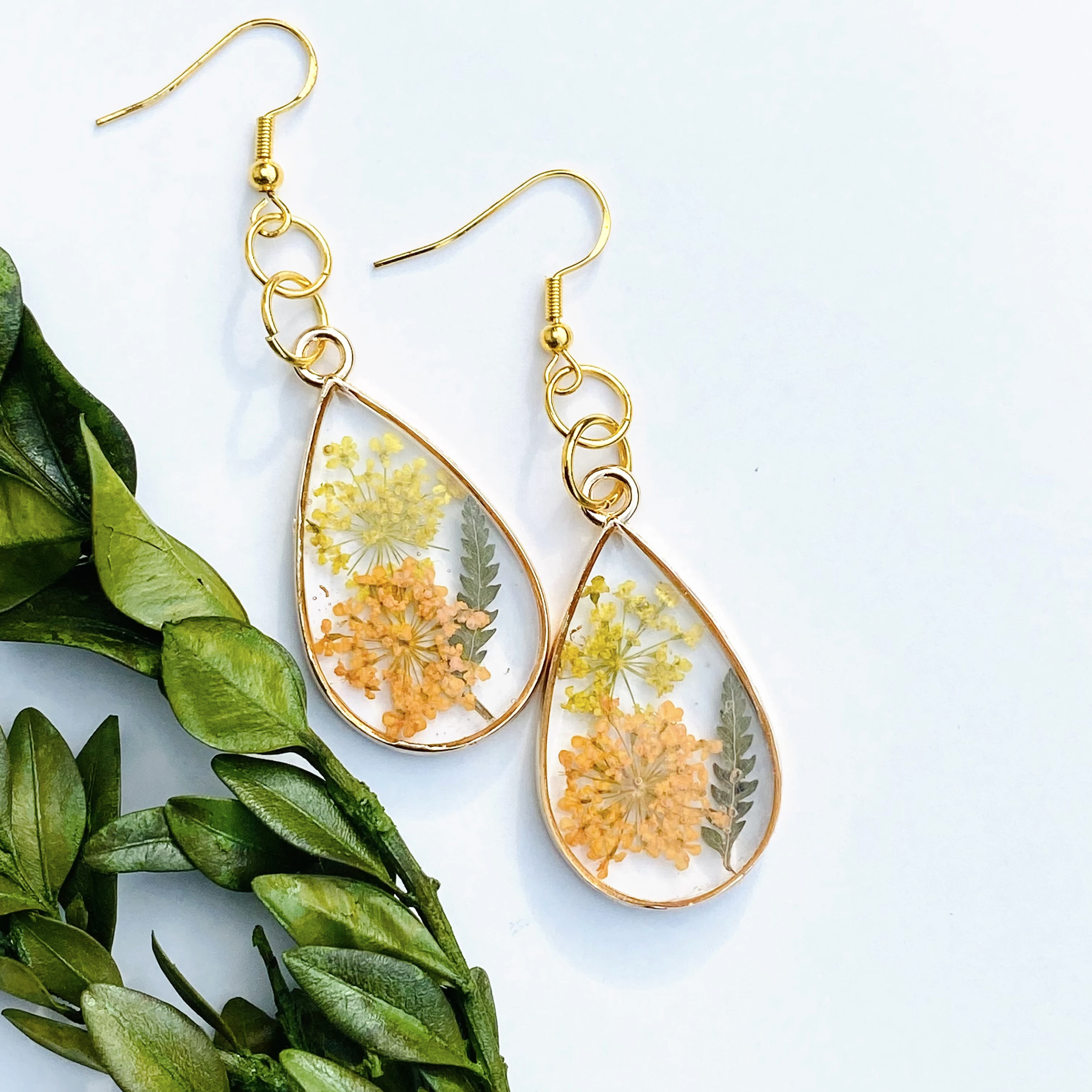 pressed plant resin earrings.png