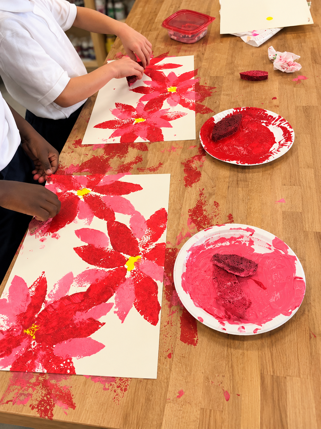 Sponge-Stamped Poinsettias in Art Class.png