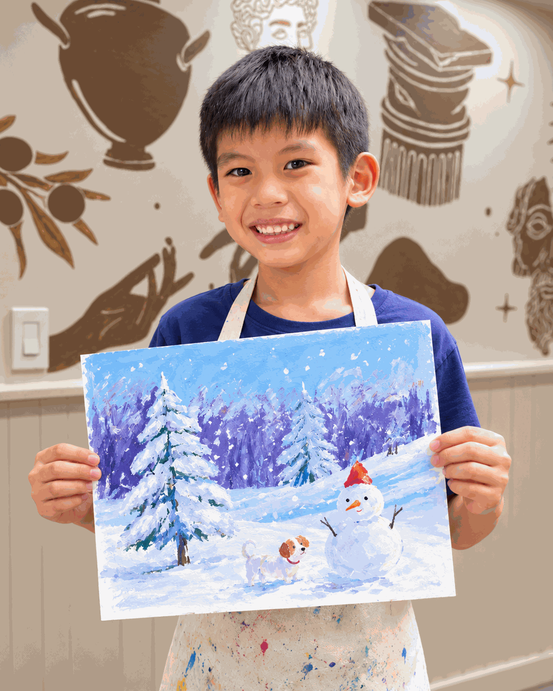 proud_young_artist_with_winter_painting_3sec.gif