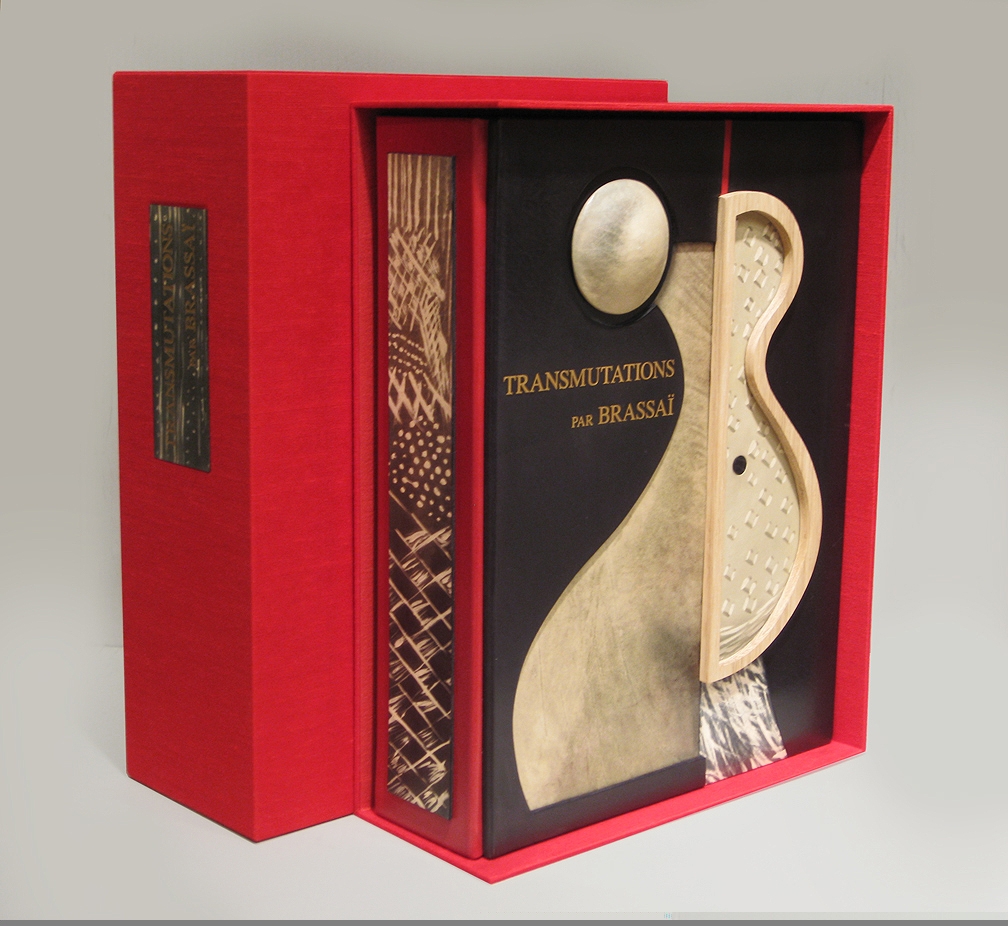 ENCLOSURE FOR BRASSAÏ "TRANSMUTATIONS 1934-35" PORTFOLIO (H:17 3/4" X W:13 1/2" X D:4 1/2"; leather, parchment, wood)