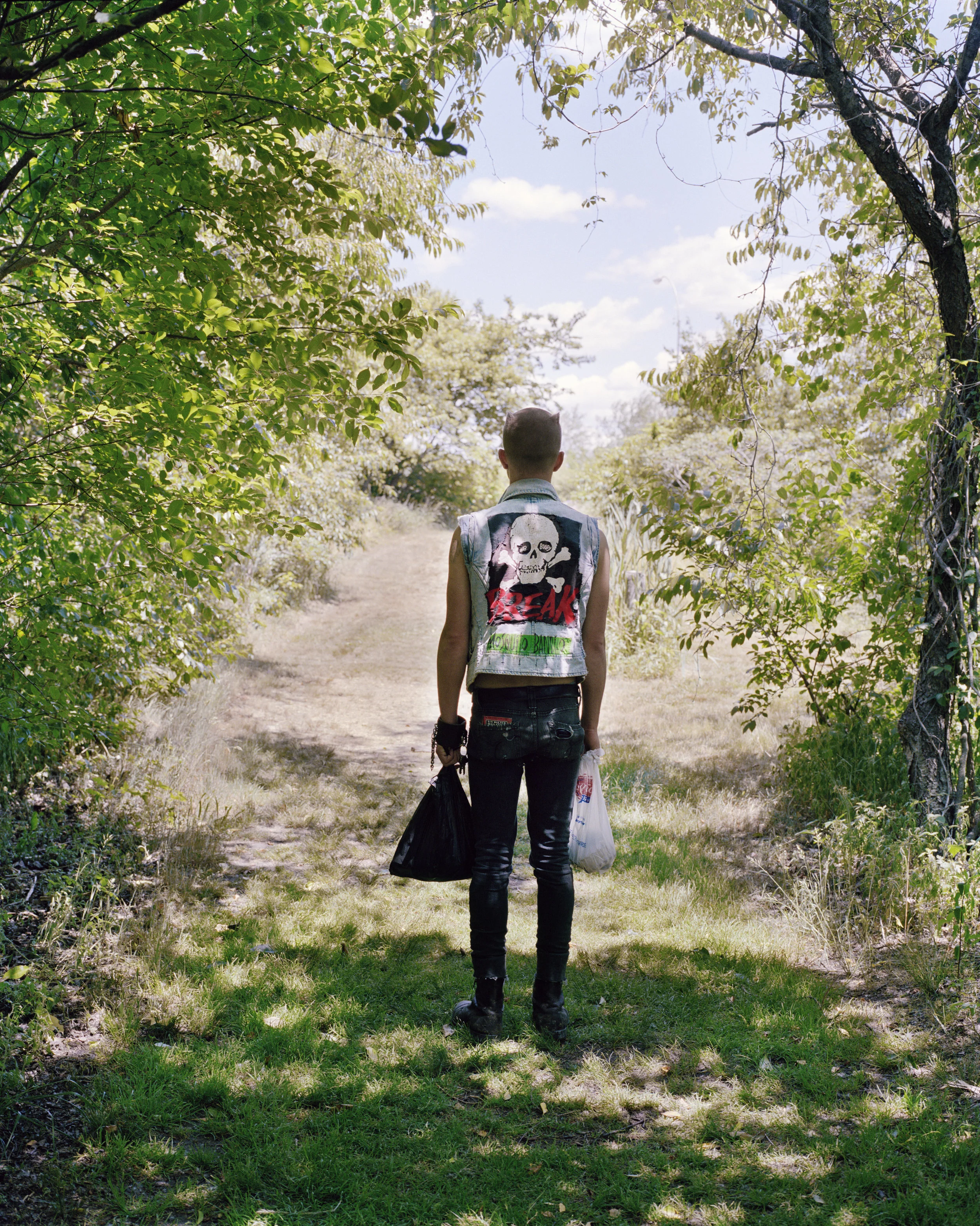 Riley grew up in rural eastern Washington. As a child he read Mark Twain’s stories of Tom Sawyer and Huckleberry Finn and decided he wanted to be like those mythical boys. He wanted a life full of treasure and adventure. Riley got his first metal detector when he was eleven and continues to seek treasure to this day. In my project, Scavenger: Adventures in Treasure Hunting , I followed Riley out on his hunts and photographed the objects he collected. In Scavenger I don’t try to reveal Riley’s essence as a traditional portrait would, but build upon it to create a more complicated presence. I express my romantic view of his life and his treasure hunting obsession and choose not to show his daily activities outside of that. By only showing one side of his personality I create a larger than life character. I photograph him in Twain’s spirit, as a mythical adventurer who exists somewhere between reality and fantasy.