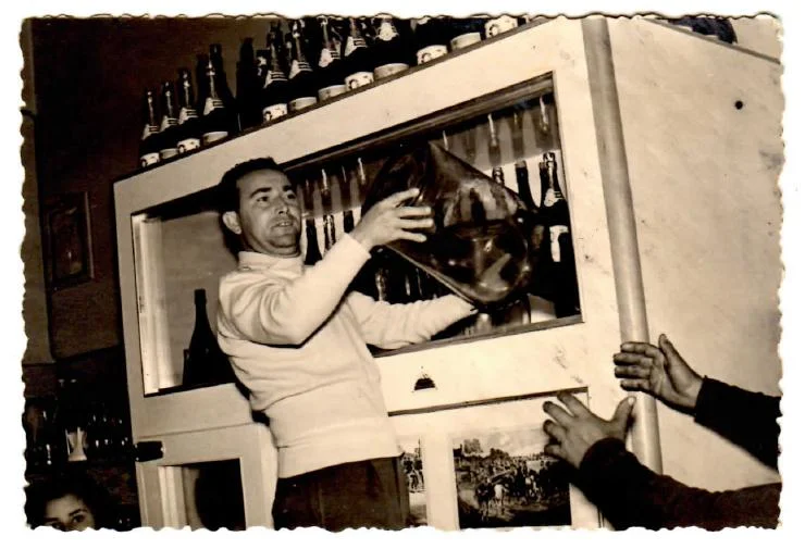 Our  nonno  (grandfather) working at the family's  trattoria  in Rome.