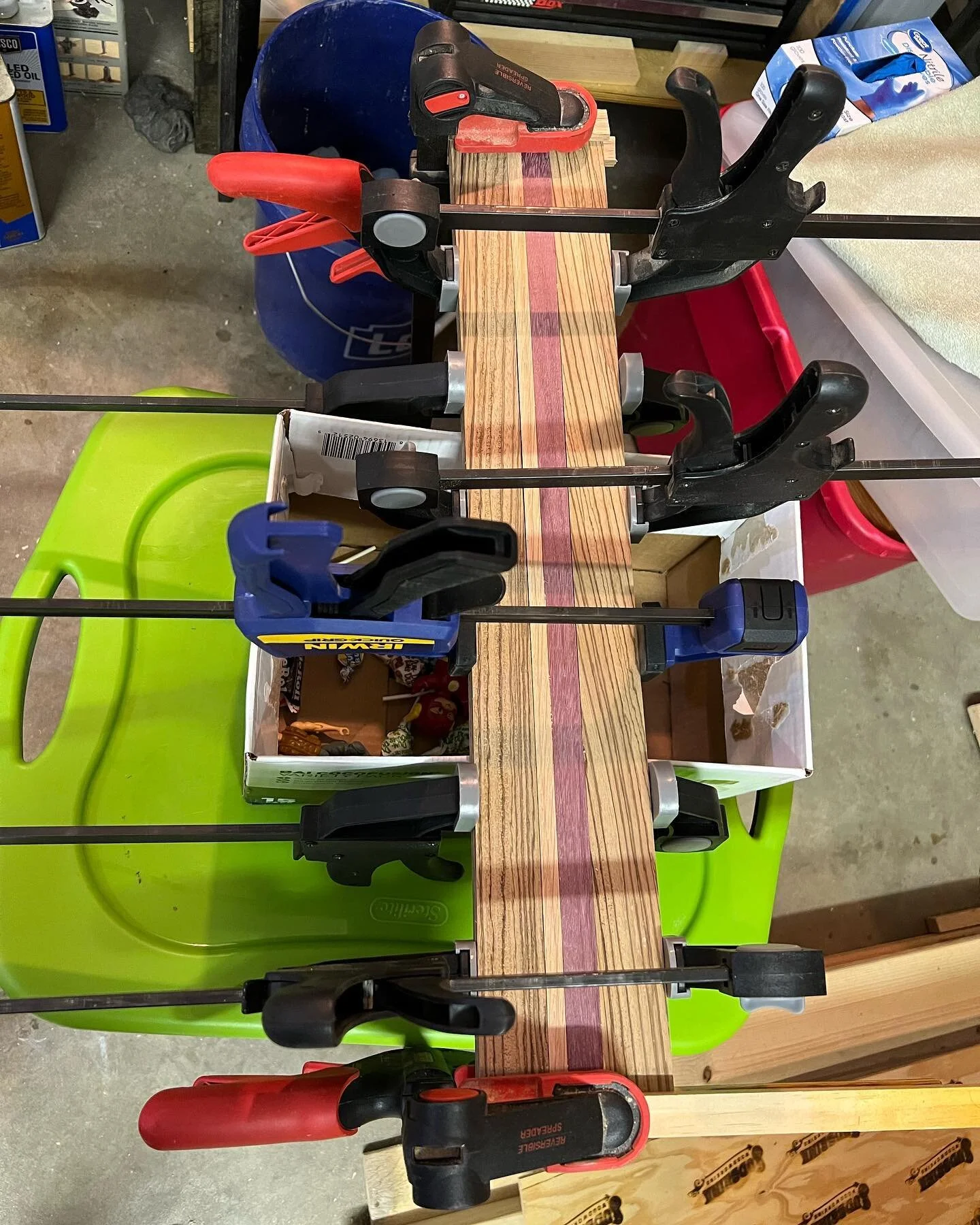 Trying to glue up some twisted boards. These cheap clamps may not work. #woodworking #woodworker #workshop #clamps