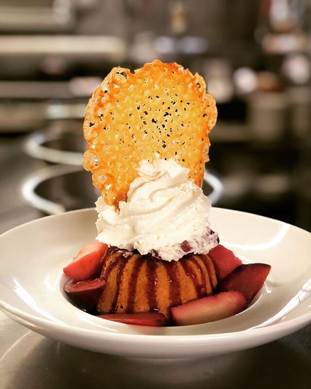 Angel food cake like you&rsquo;ve never seen before! Served with red wine poached apples and plums, whipped cream and topped with an orange tuille. Only at the Arad Evans Inn.