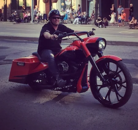 Brandon Richardson, owner of Deja Vu Café, out for a ride on his hog.