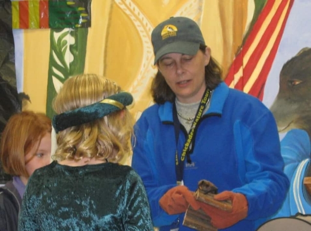 Kimberly Epp with outreach Little Brown Bat, Echo. Circa 2006. Photo via Chickadee Nature Tours.