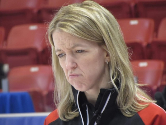 Team Ontario skip Julie Hastings scrutinizing a shot