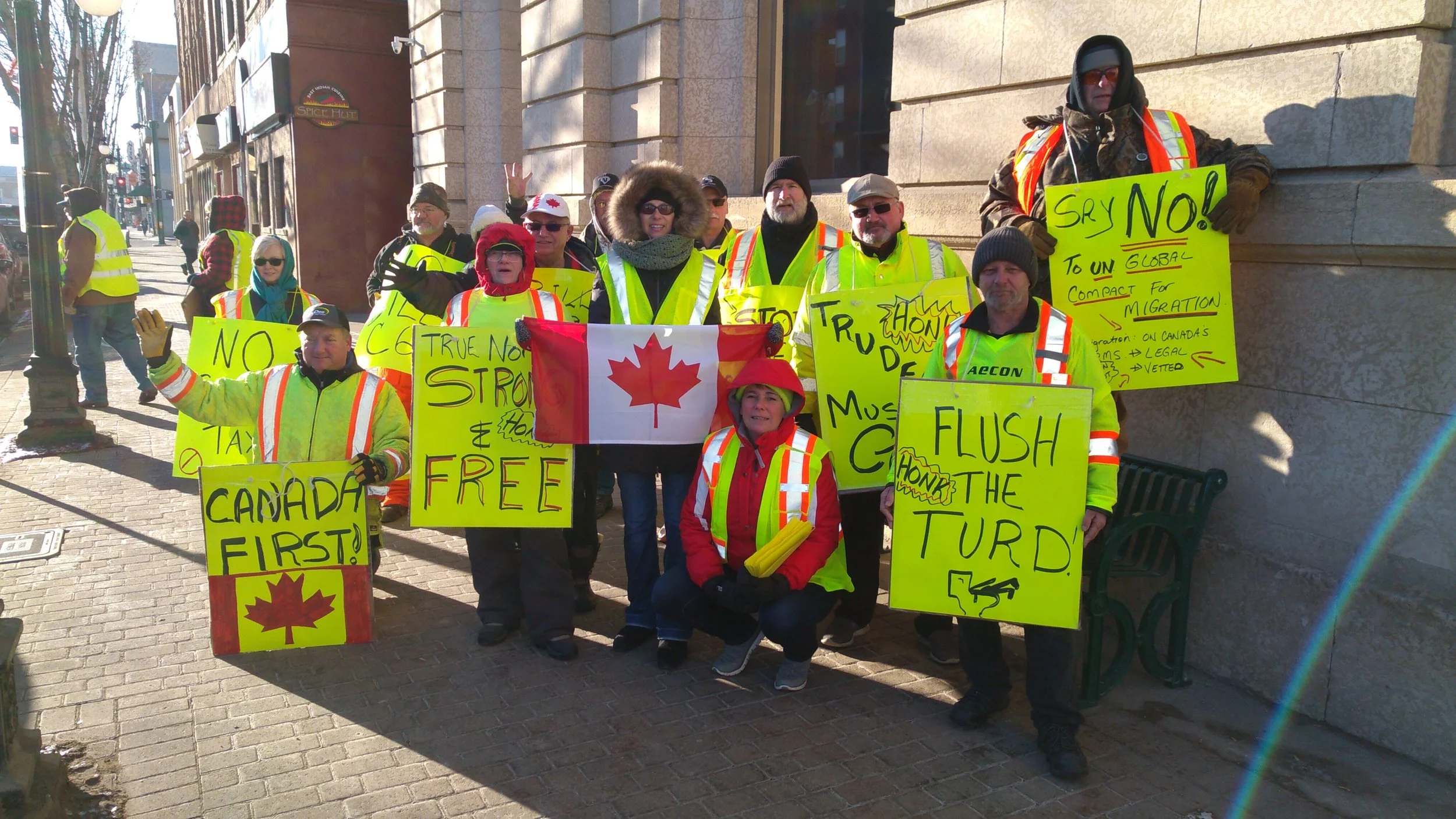 Group photo of some of the protesters today in front of City hall.