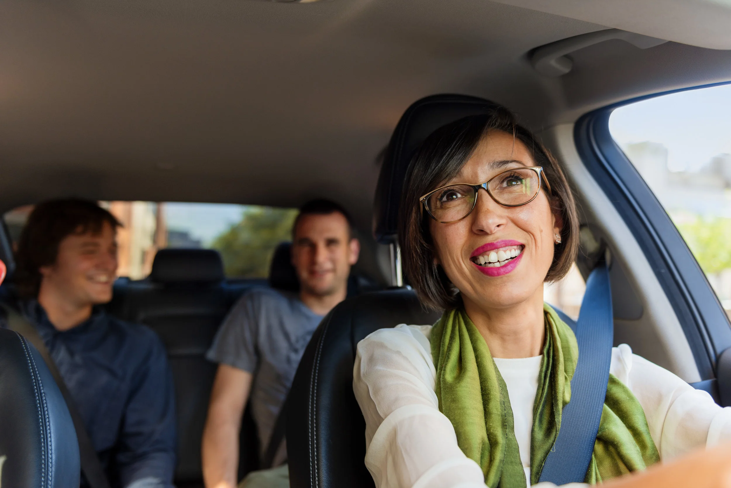 An Uber driver with passengers - Photo Compliments Uber Canada