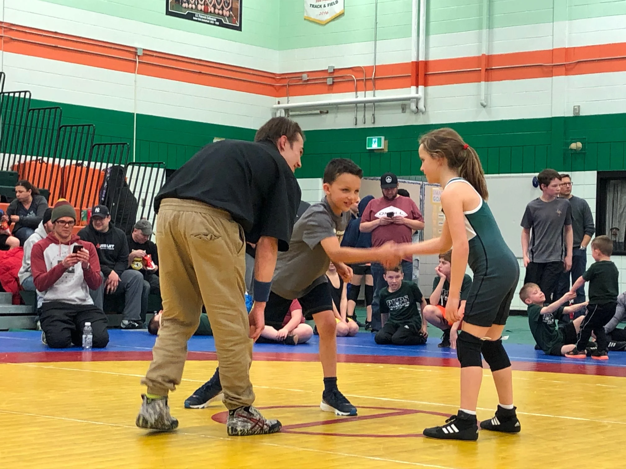 Shaking hands at the start of the match is Migael Albert (left) - Hoy Hill Photo