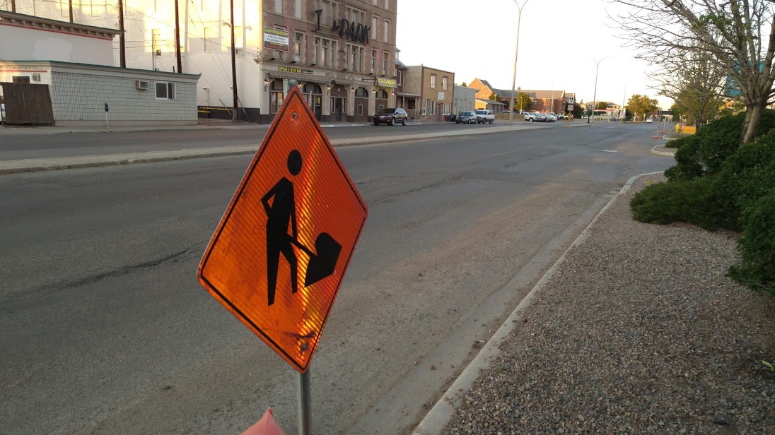 The At Work Sign was already to gop on Sunday evening as today resurfacing begins on Manitob Street - MJ Independent Photo