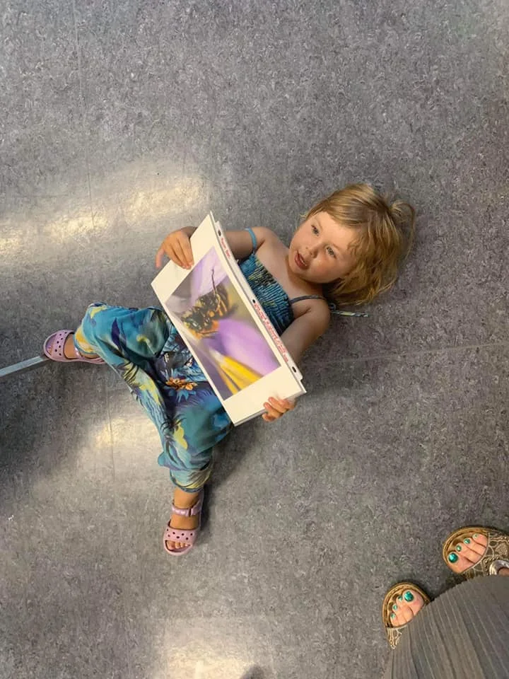 One of the participants was mesmerized by a photo of Mason Bee larvae within a pen - Photo by Chinook Gravelbourg Library