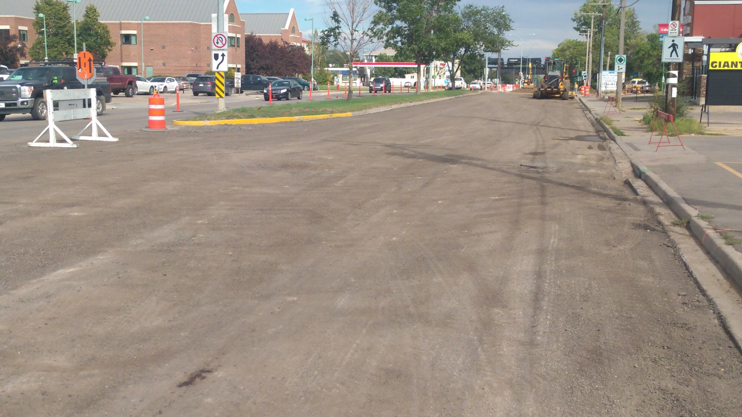The south lane of Manitoba Street East from Main St to Second Ave NE remains closed