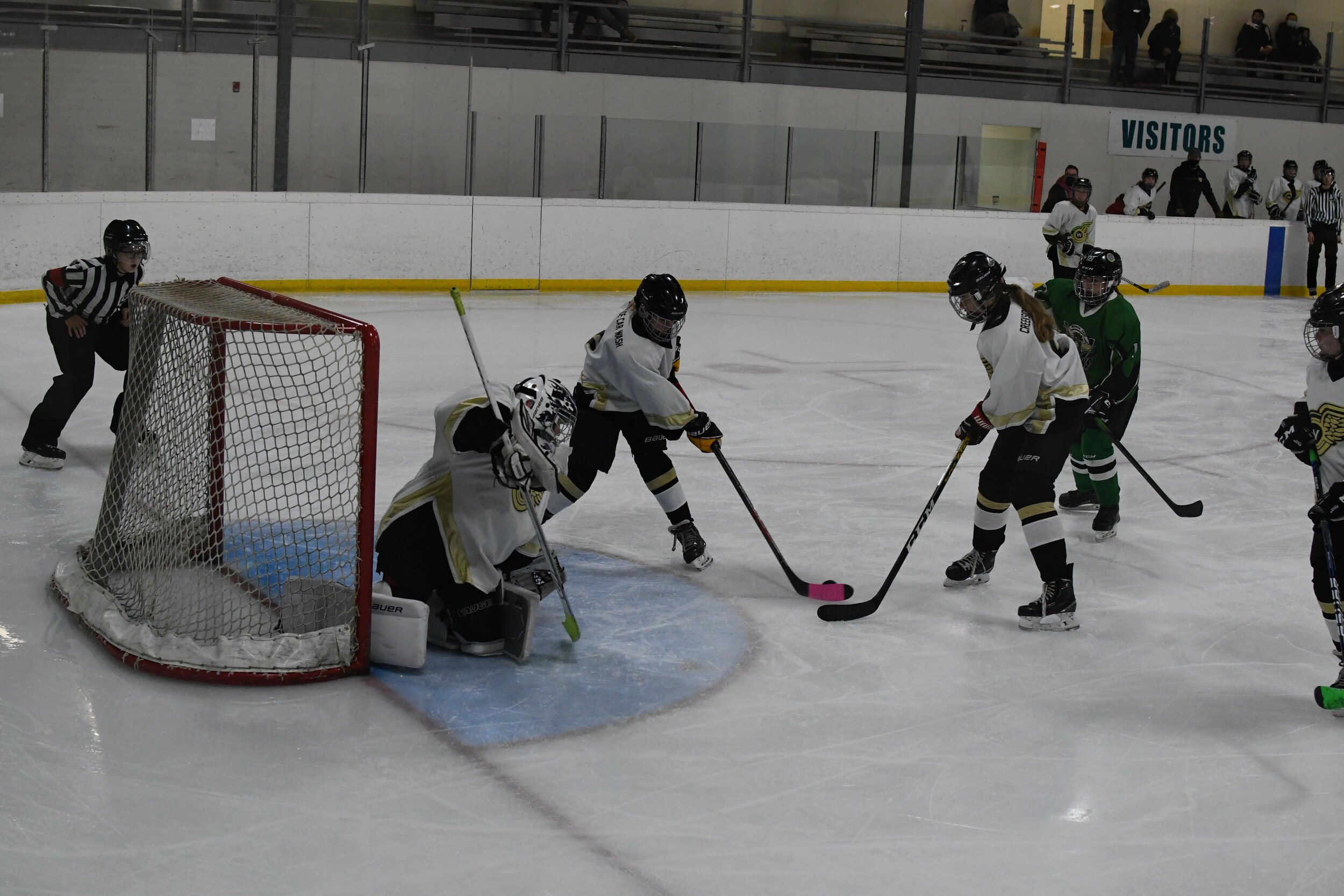 Weyburn’s netminder Karley Martin gave up one of her rare rebounds of the night recovered by the Gold Wings defense - MJ Independent photo