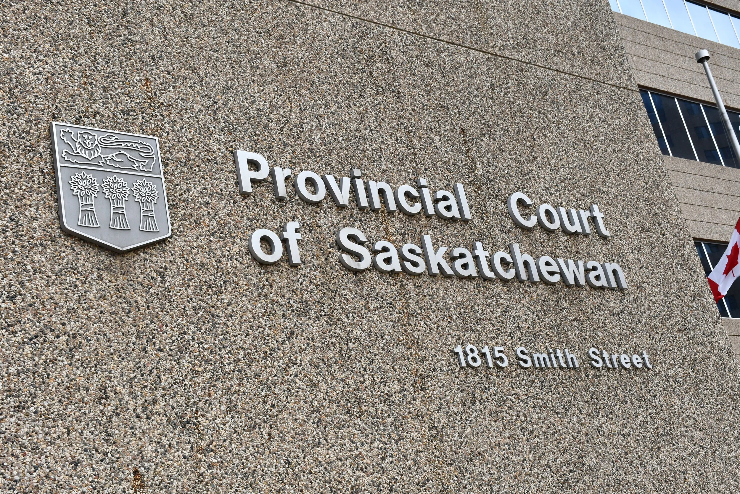 Business Owner Facing Regina Charges