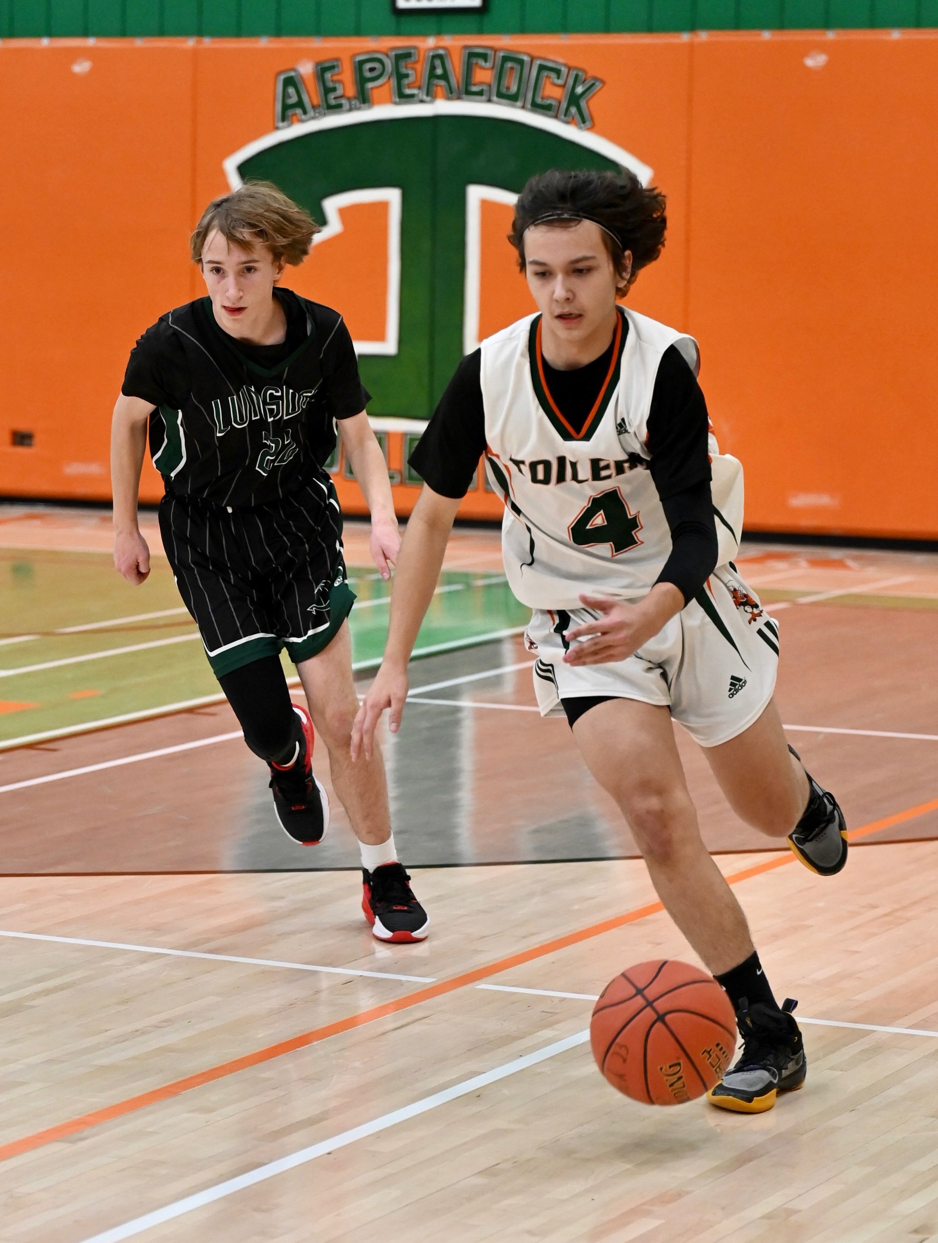 Toilers Show Off New Gym Floor With a Win - Junior Basketball Wrapup