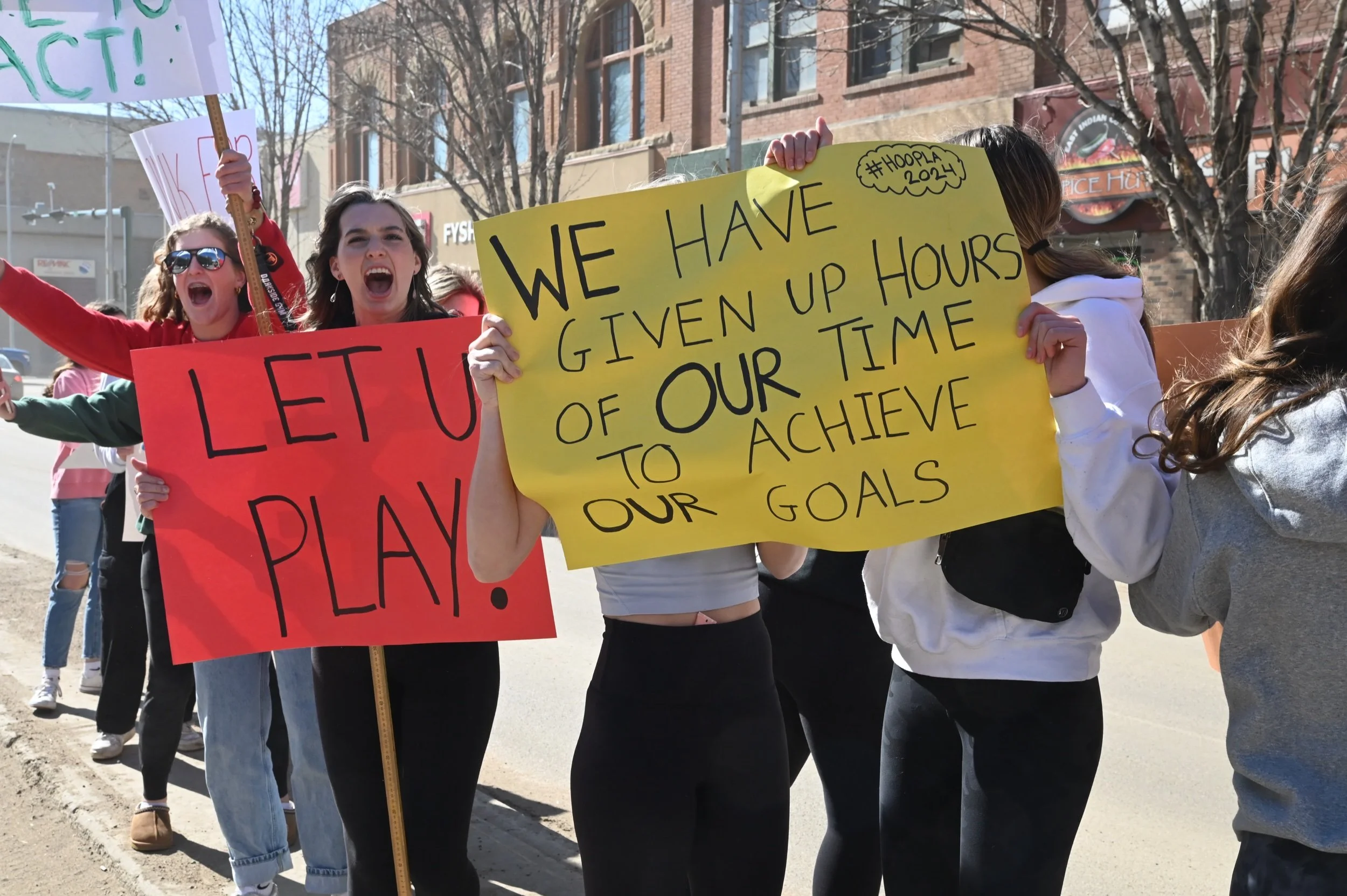 “We Want Hoopla! We Want Hoopla!” Students Message During Noon Hour Protest 
