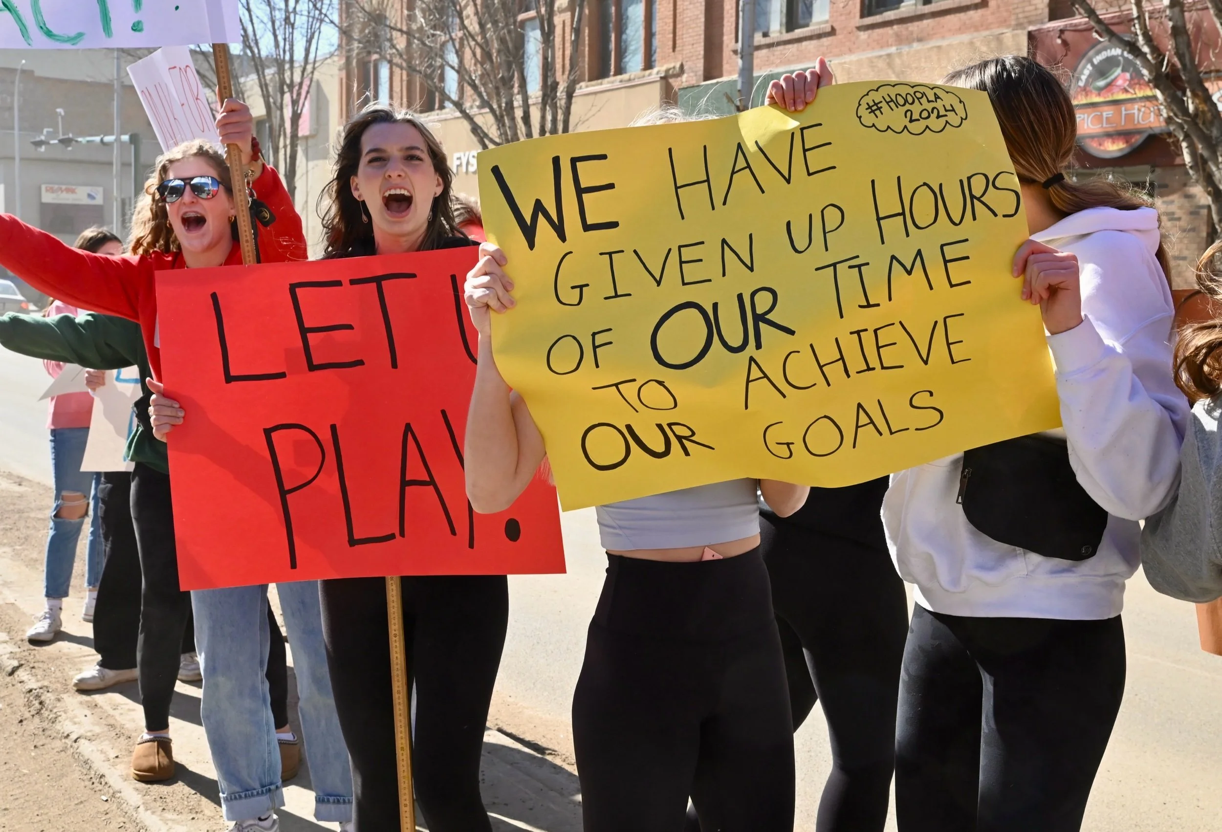 “We Want Hoopla! We Want Hoopla!” Students Message During Noon Hour Protest