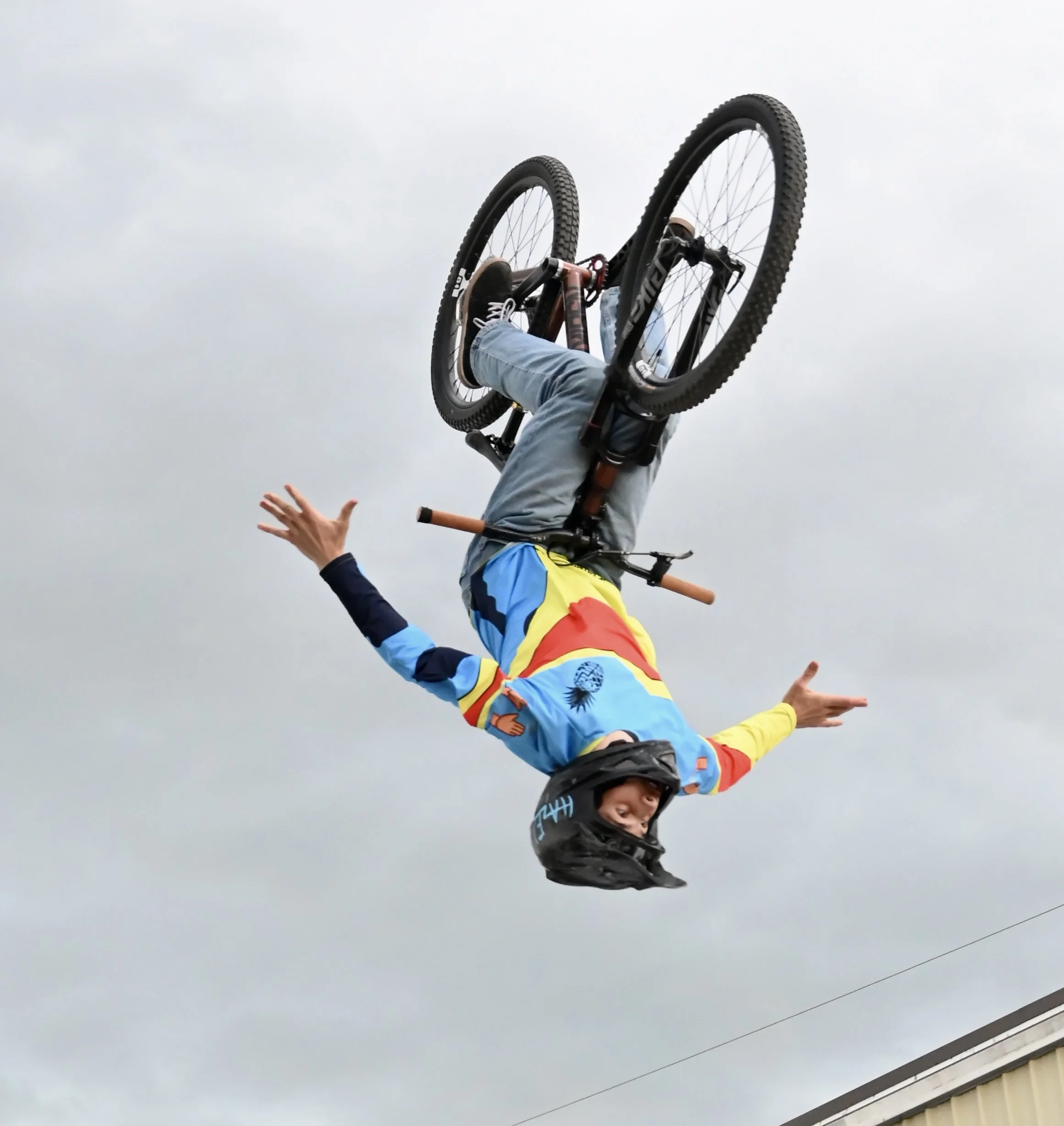 Despite High Flying Stunts BMX Stunt Rider Still Has His Feet Firmly Planted On The Ground