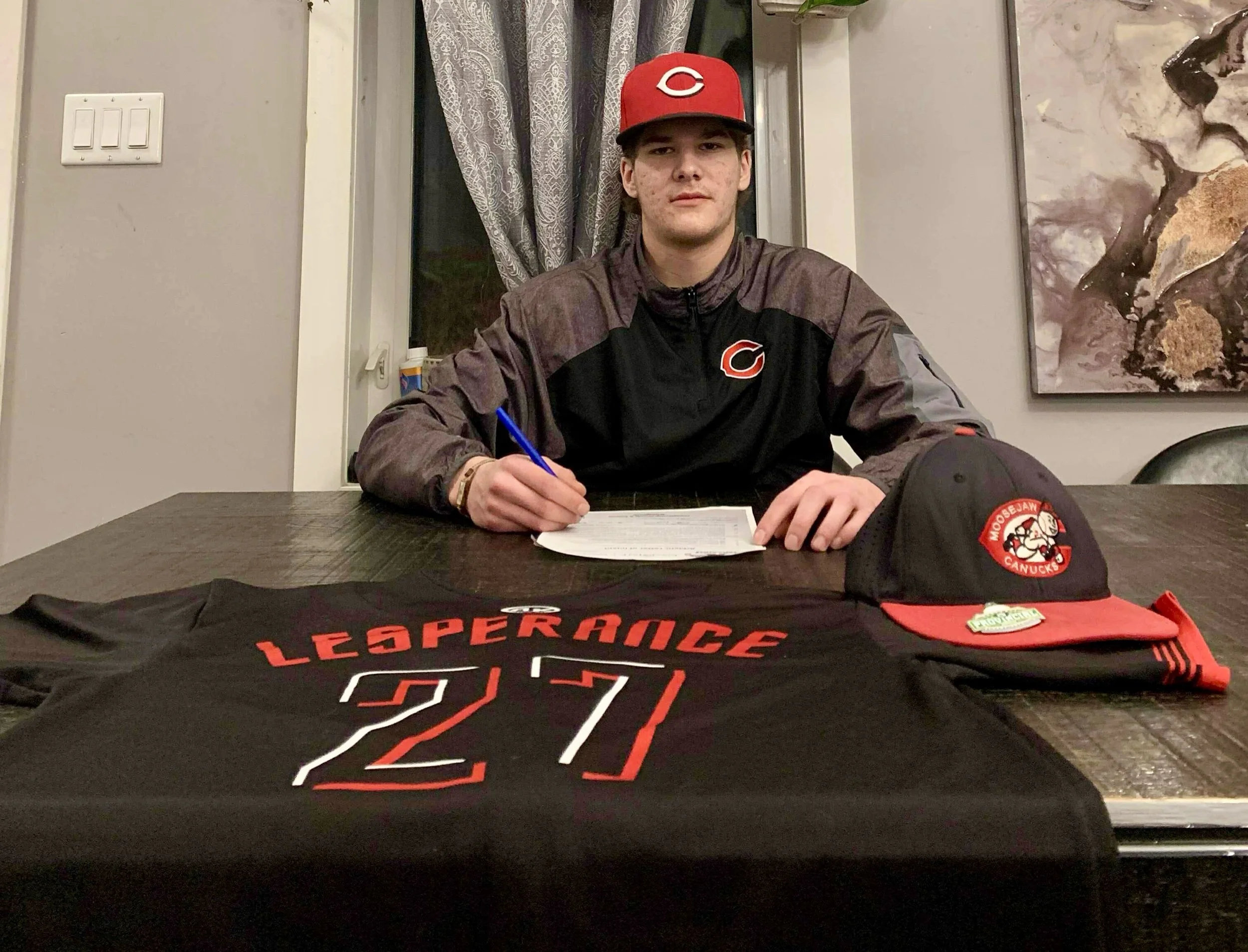 Lesperance Signs With US College 