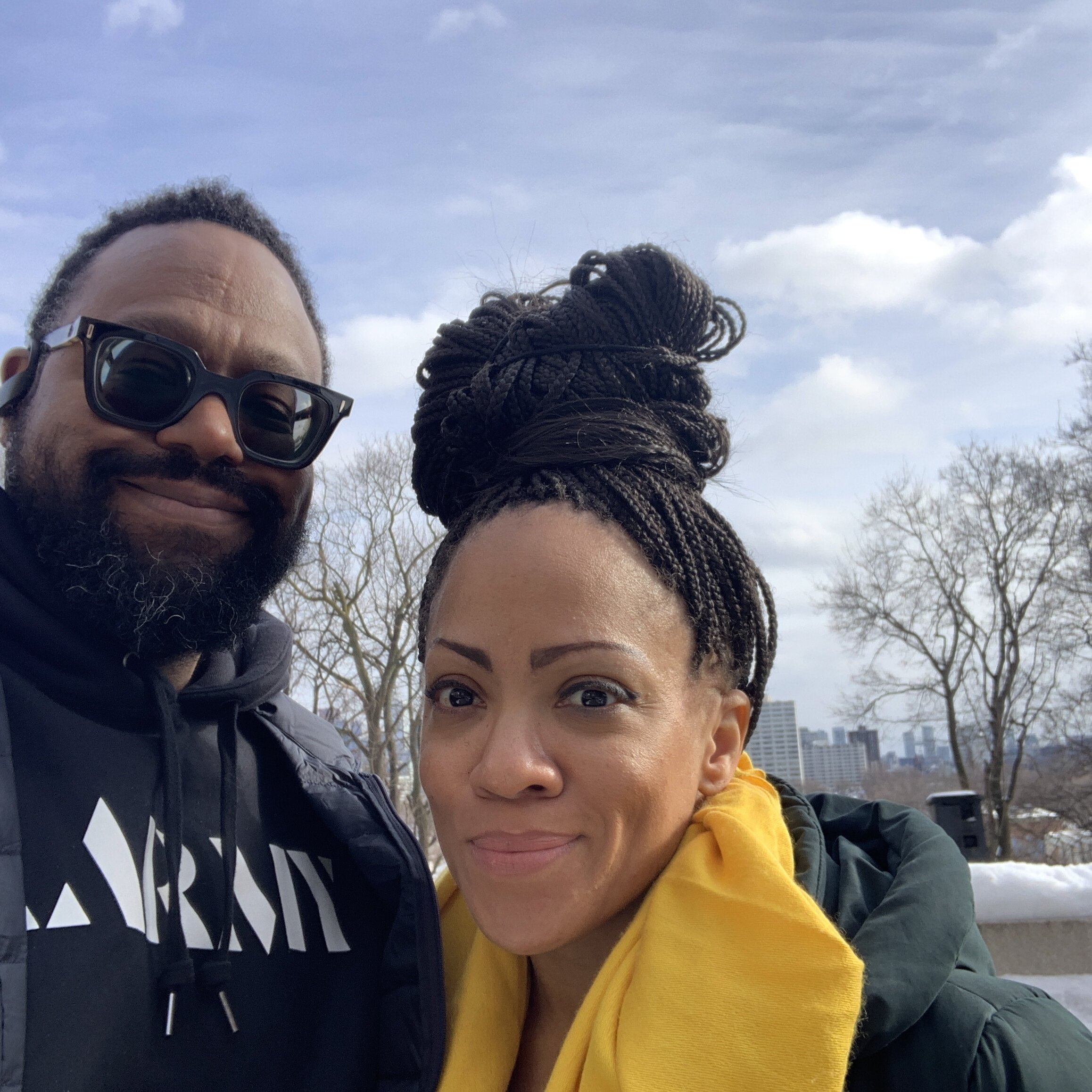 An image of the author and her husband outside on a sunny day.