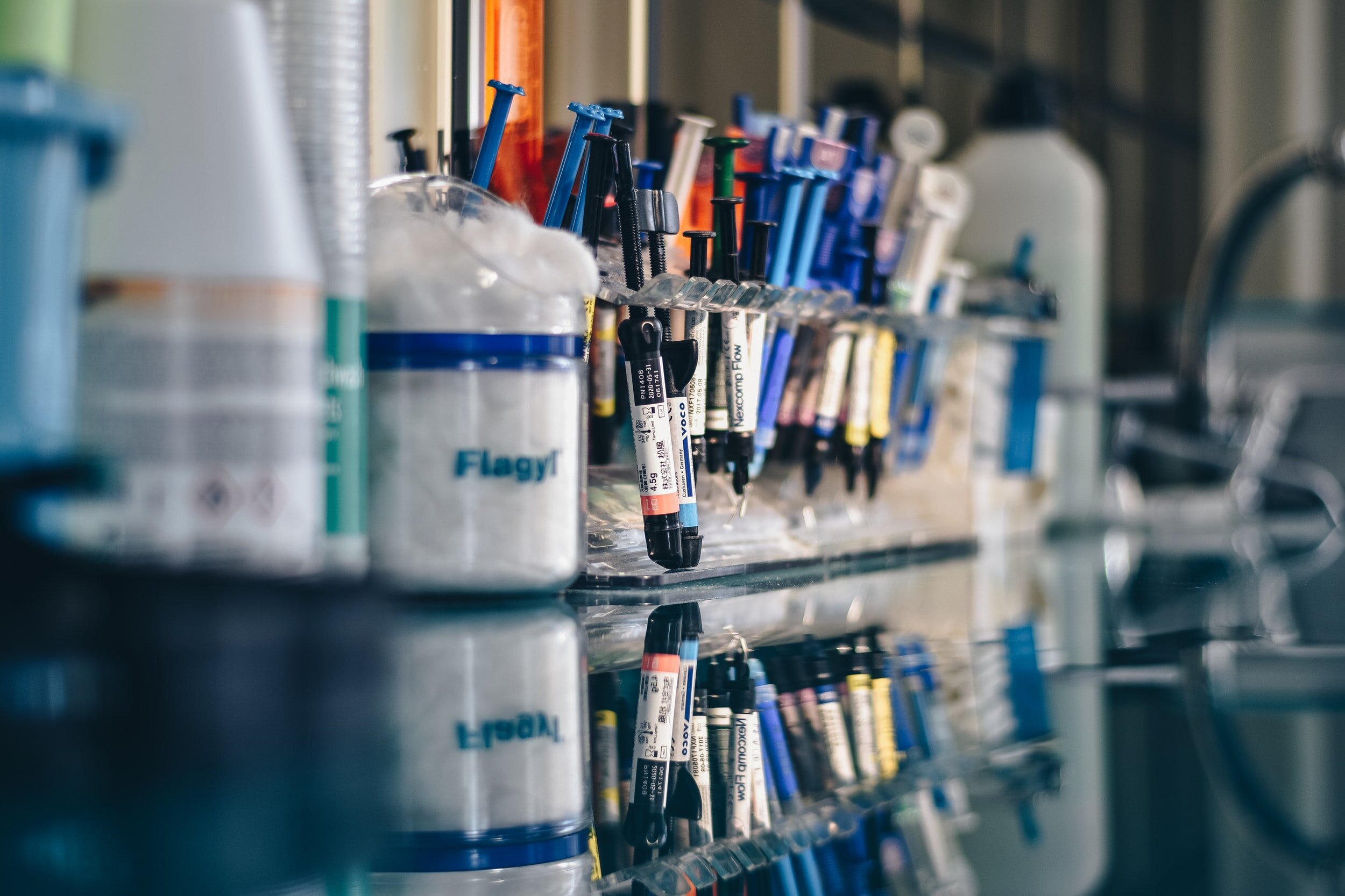 Photo of laboratory equipment on a counter by Ibrahim Boran on Unsplash