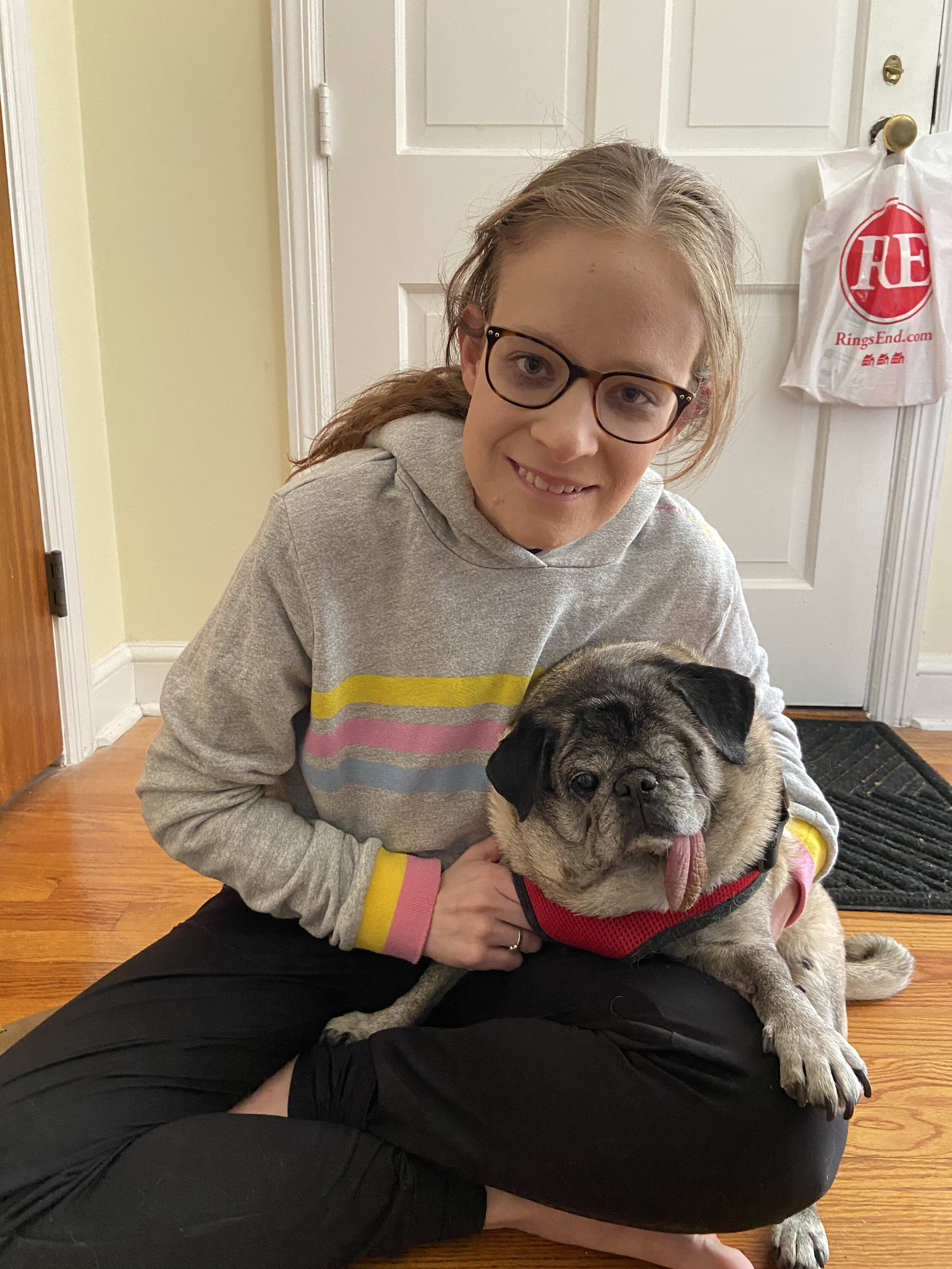 The blogger hanging out with her pug friend, Victoria.