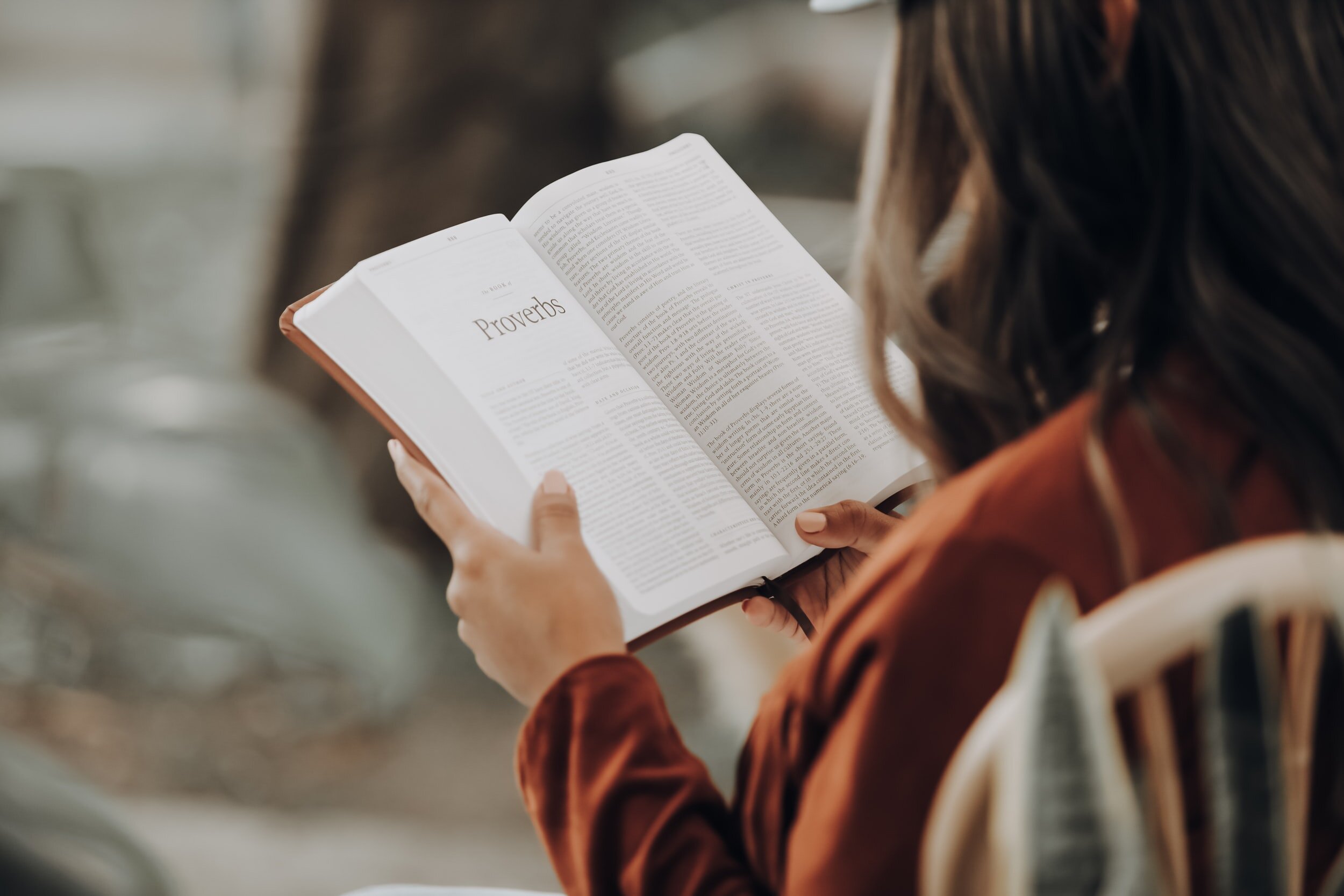 Photo by Joel Muniz on Unsplash A person reads a book.