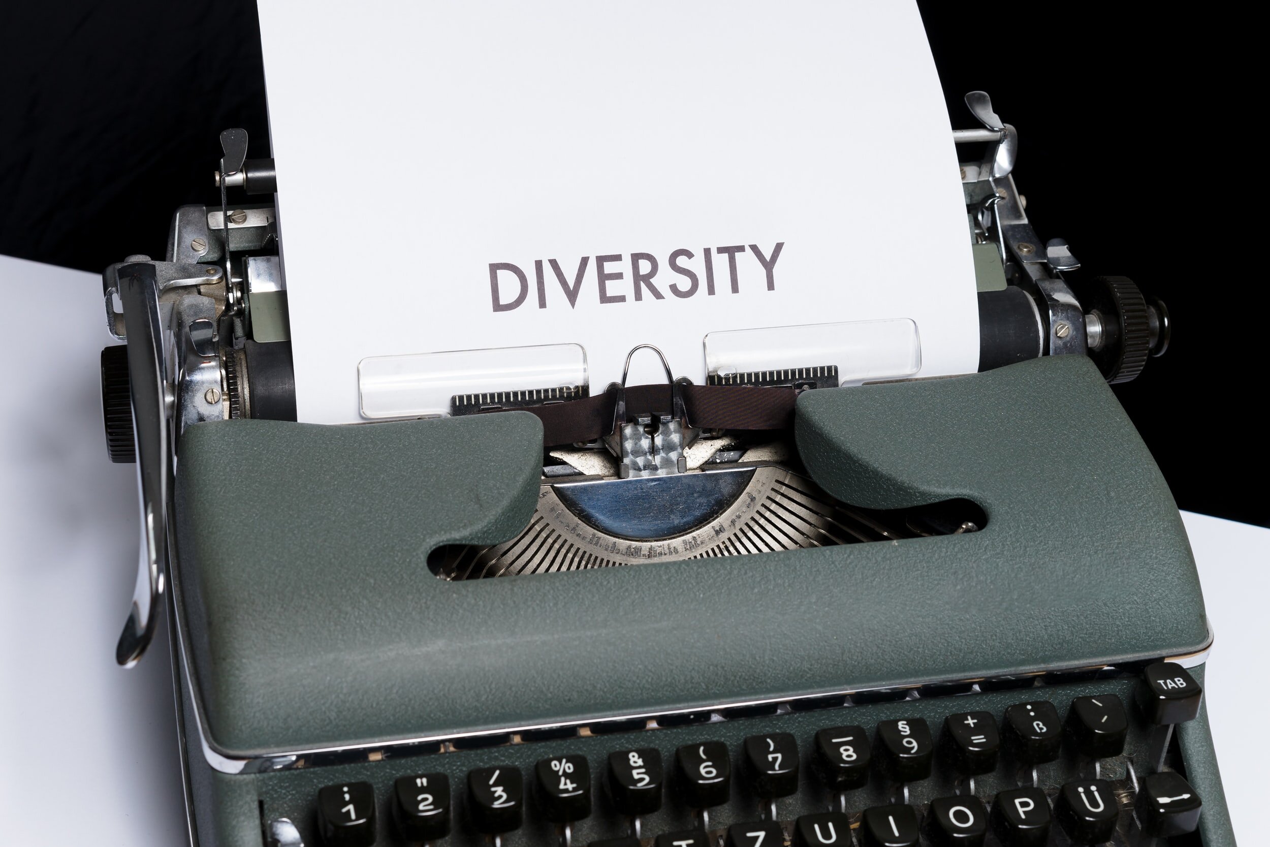 Photo by Markus on UnsplashA white piece of paper with black text reading “Diversity” comes out of a typewriter.