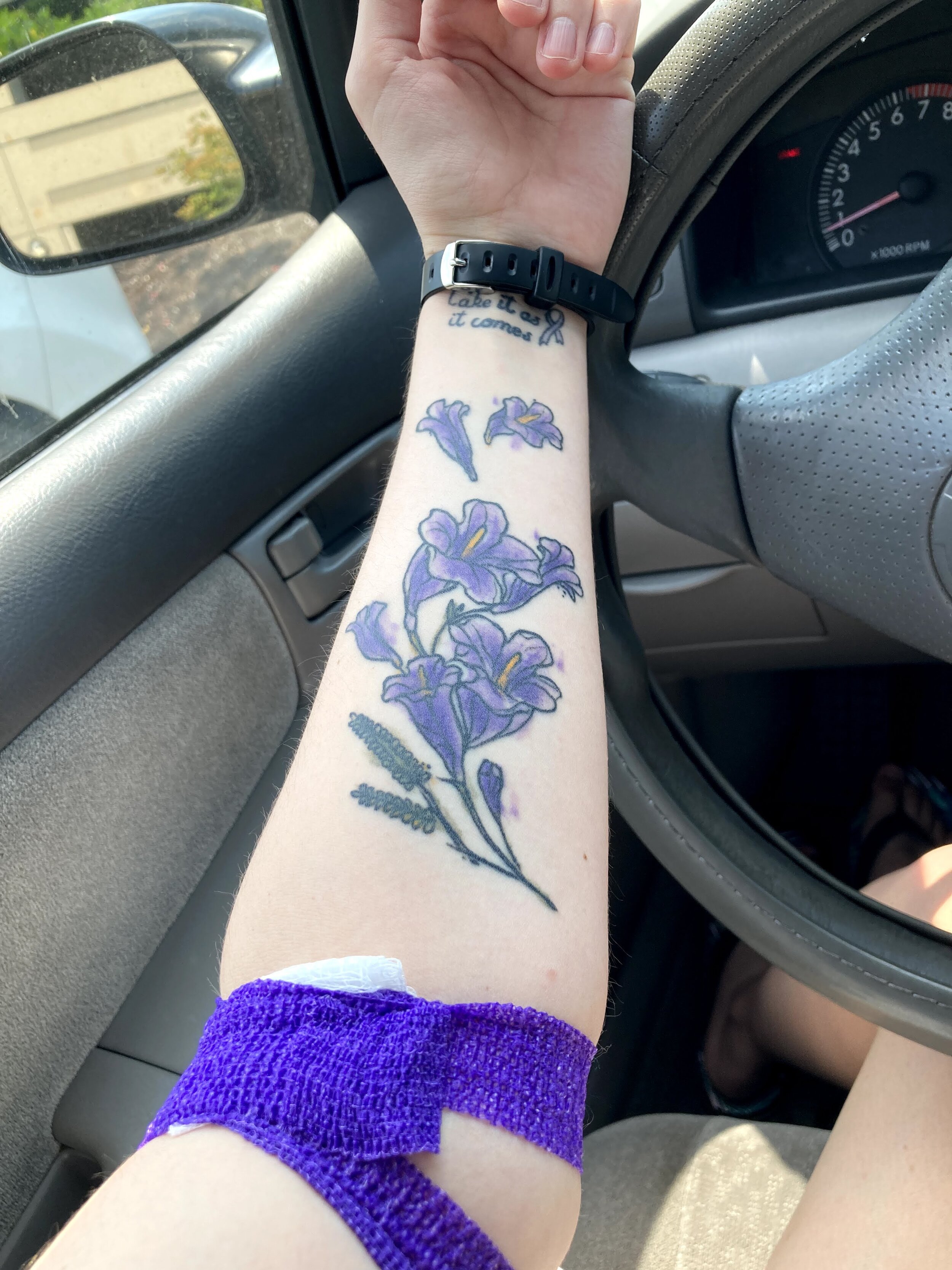 Lizzie’s beautiful Jacaranda flowers tattoo.