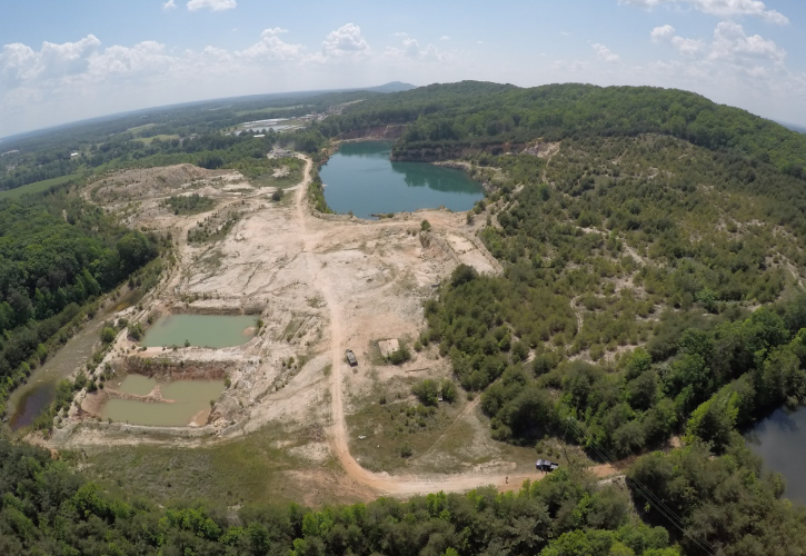 BUCKHORN SAND MINE Disposition of 115 Acres of Industrial Land