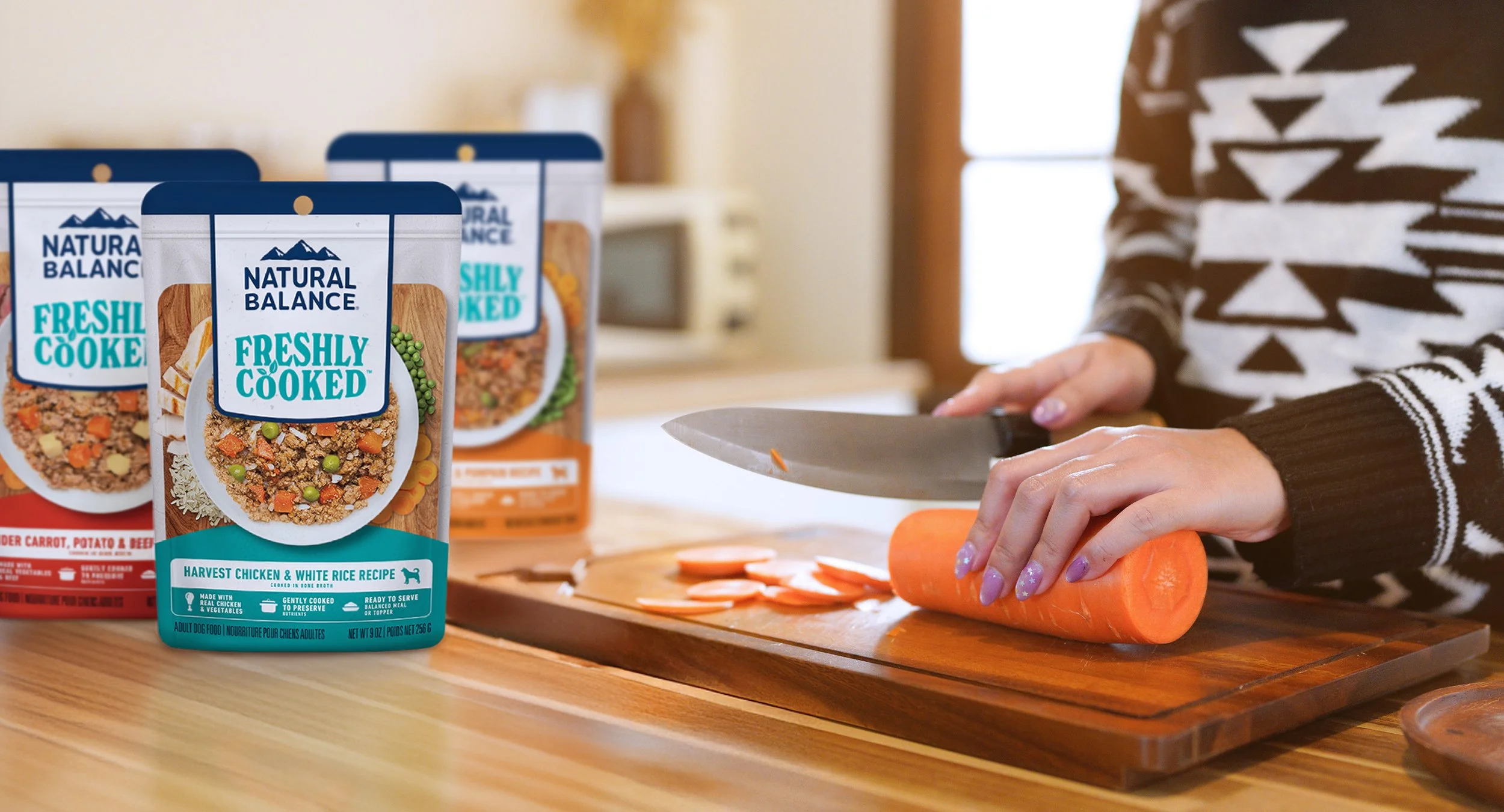 Woman preparing Natural Balance Freshly Cooked dog food
