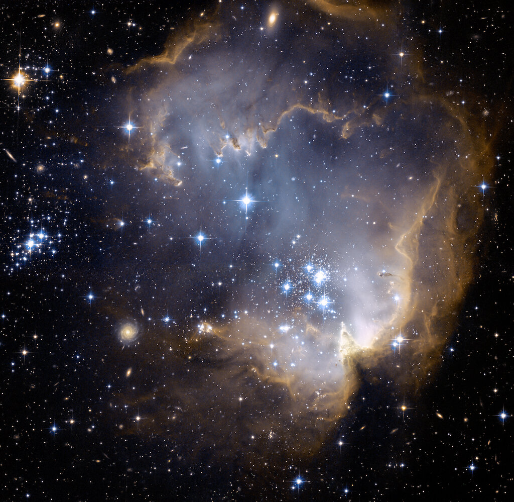 Hubble - New Stars Give Light to the Past.jpg