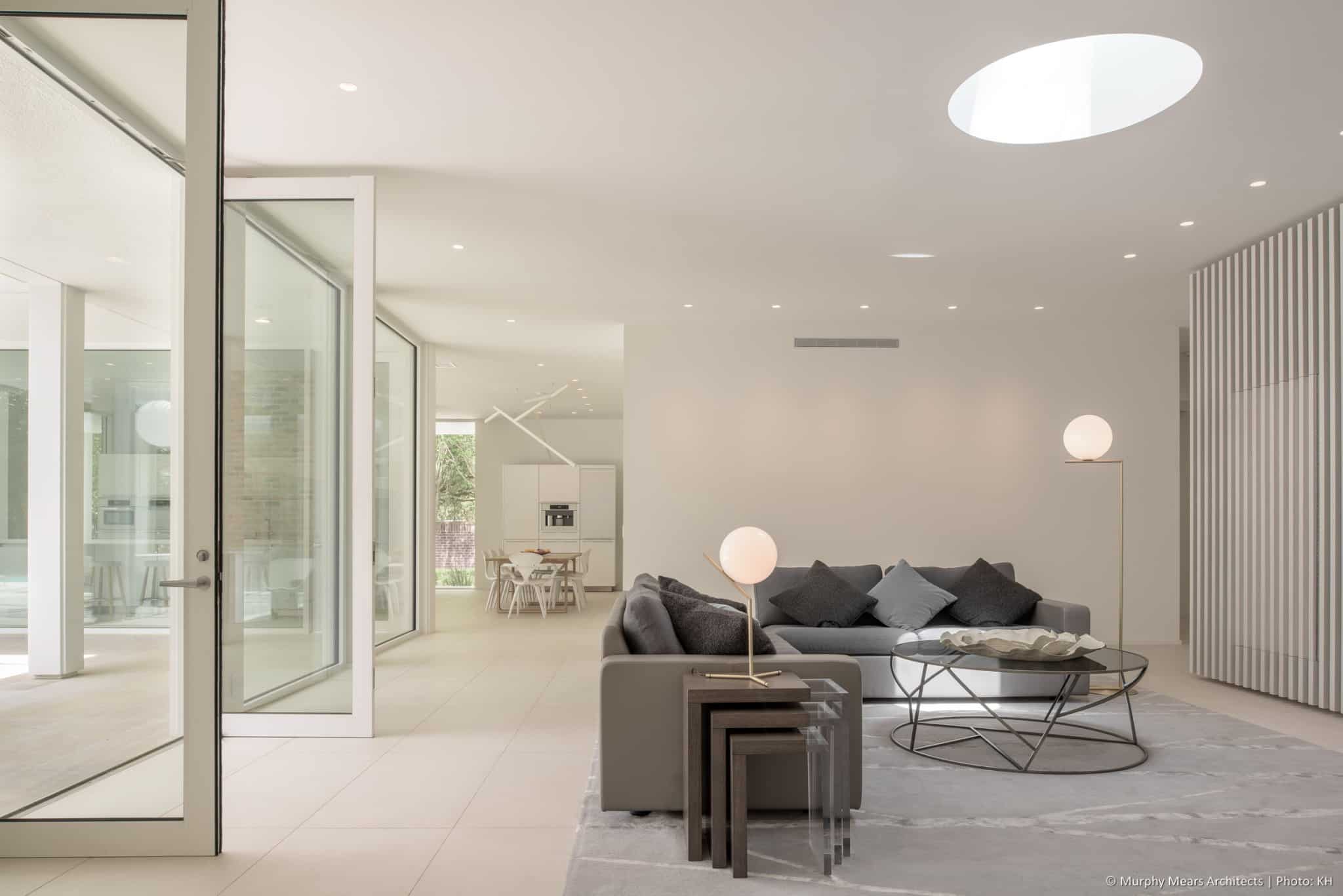 w-mid-century-modern-home-hugo-neuhaus-renovation-living-room-skylight-fin-wall2.jpg